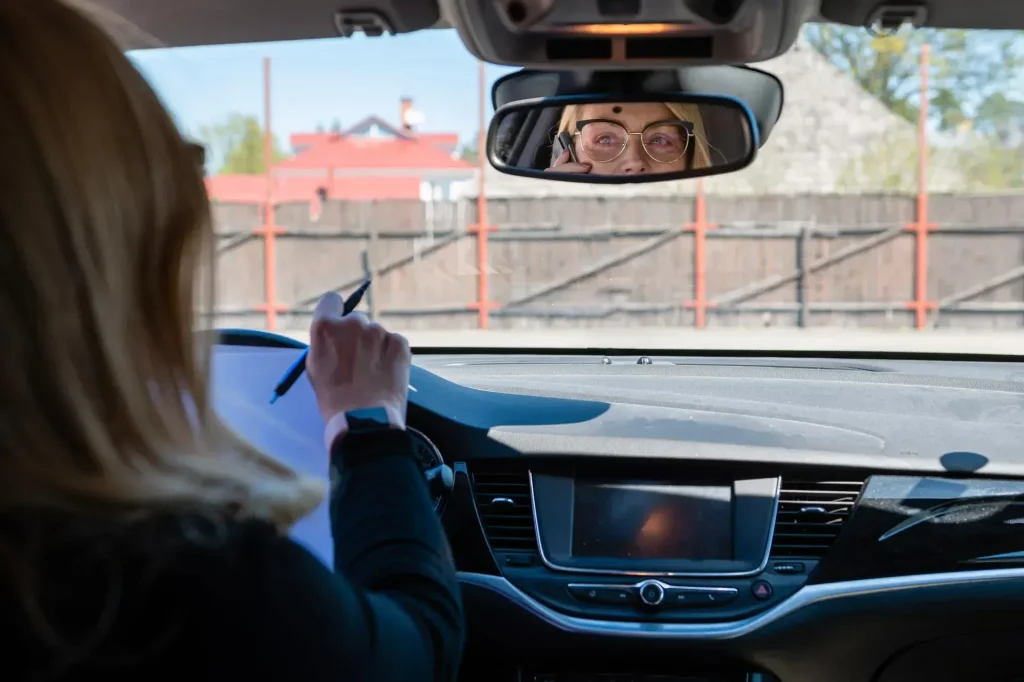Instructor guiding a learner driver during a car lesson best driving school in London focused on safe and confident driving.